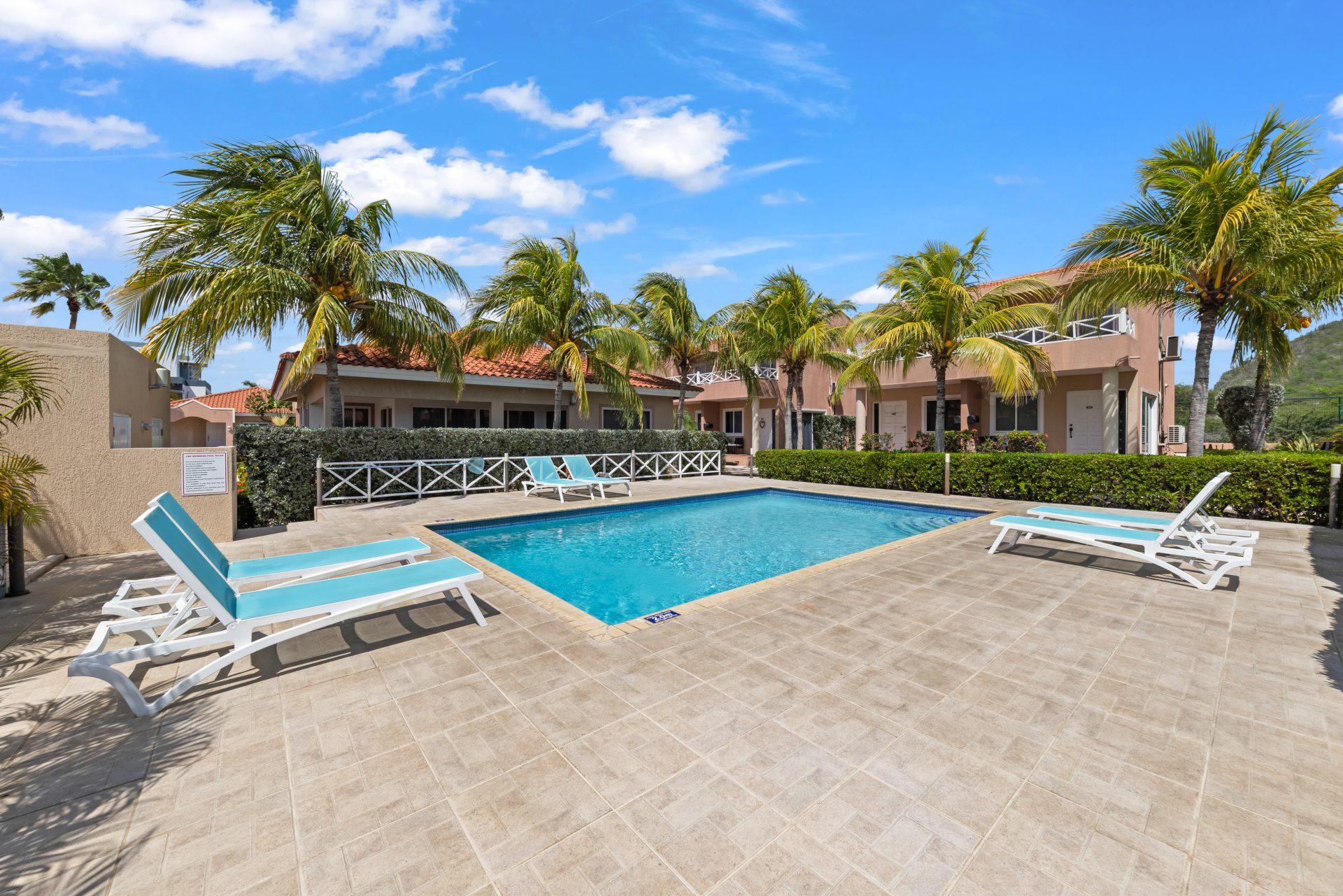 Curaçao real estate, Airbnb-ready bungalow for sale near community swimming pool and sundeck