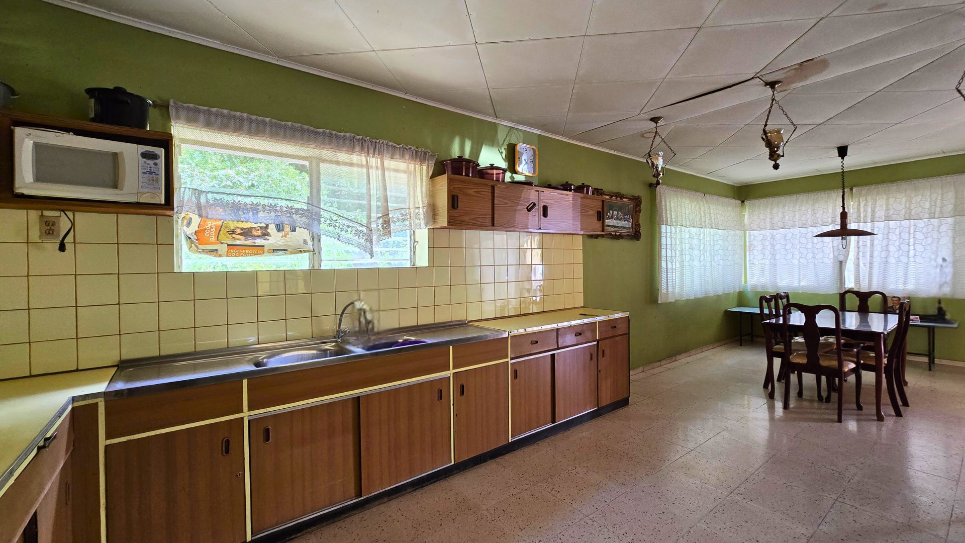 Extended kitchen counter with ample storage cabinets