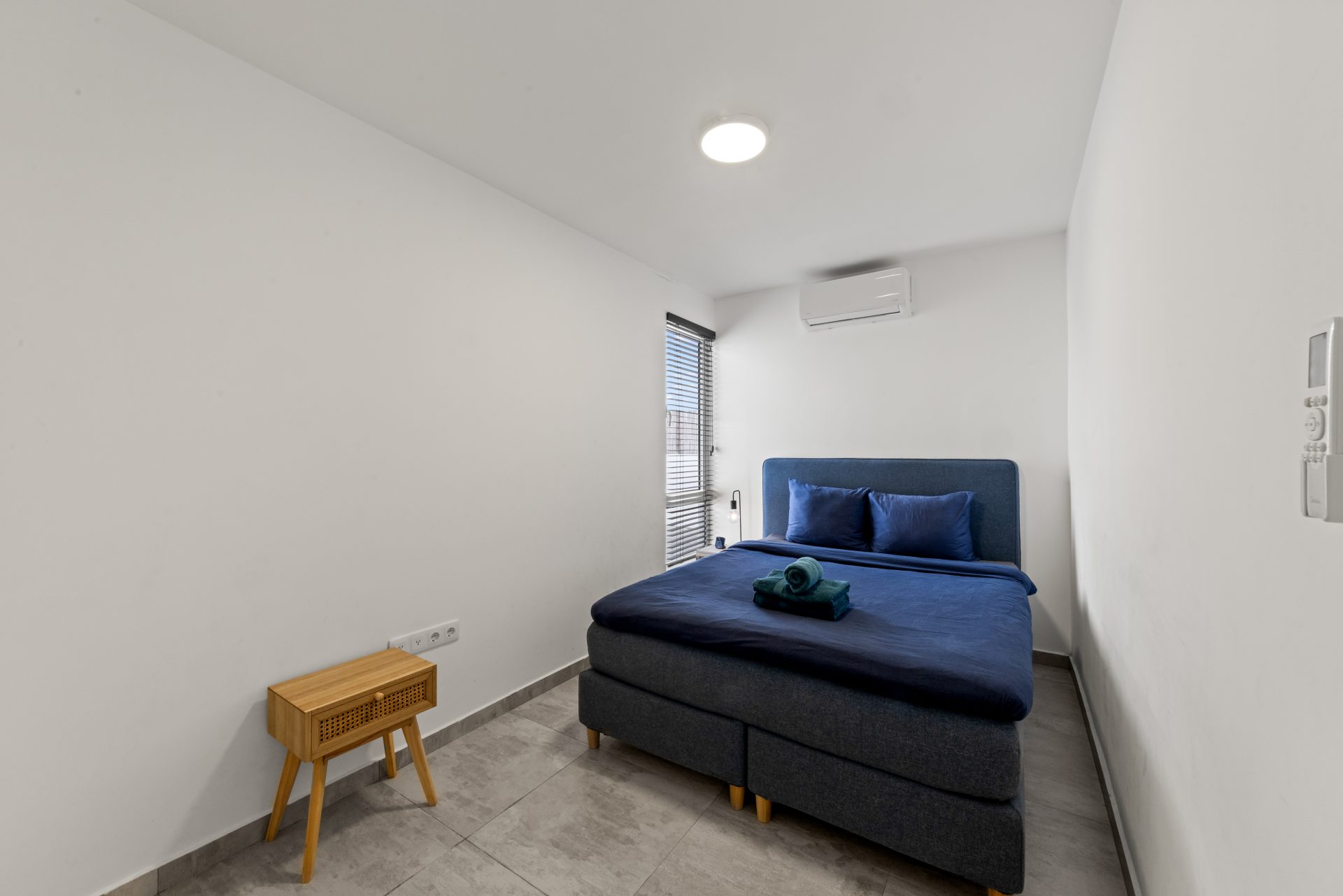 for sale in curaçao real estate in turnkey villa in Vredenberg bedroom with double bed and minimal decor
