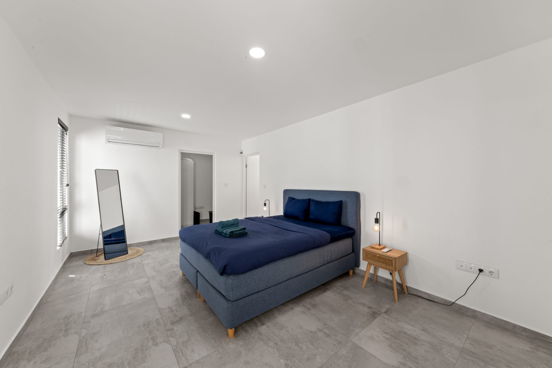 for sale in curaçao real estate in turnkey villa in Vredenberg bedroom with double bed and minimal decor
