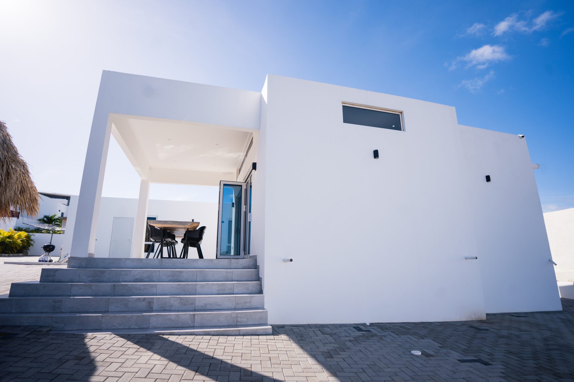 Curacao real estate for sale – Covered patio area with outdoor dining furniture.