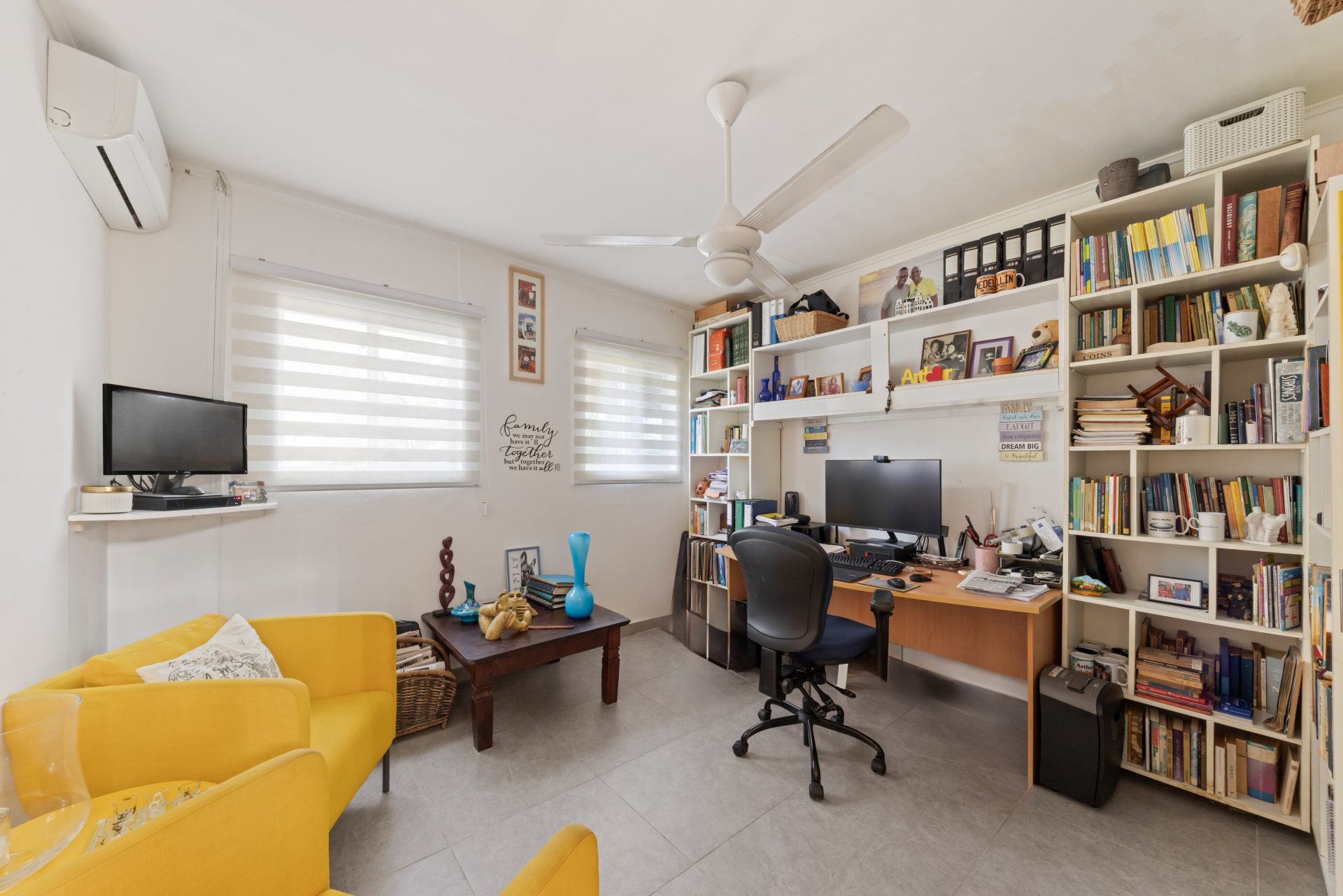 jan thiel villa for sale - home office workspace with built-in shelving and desk