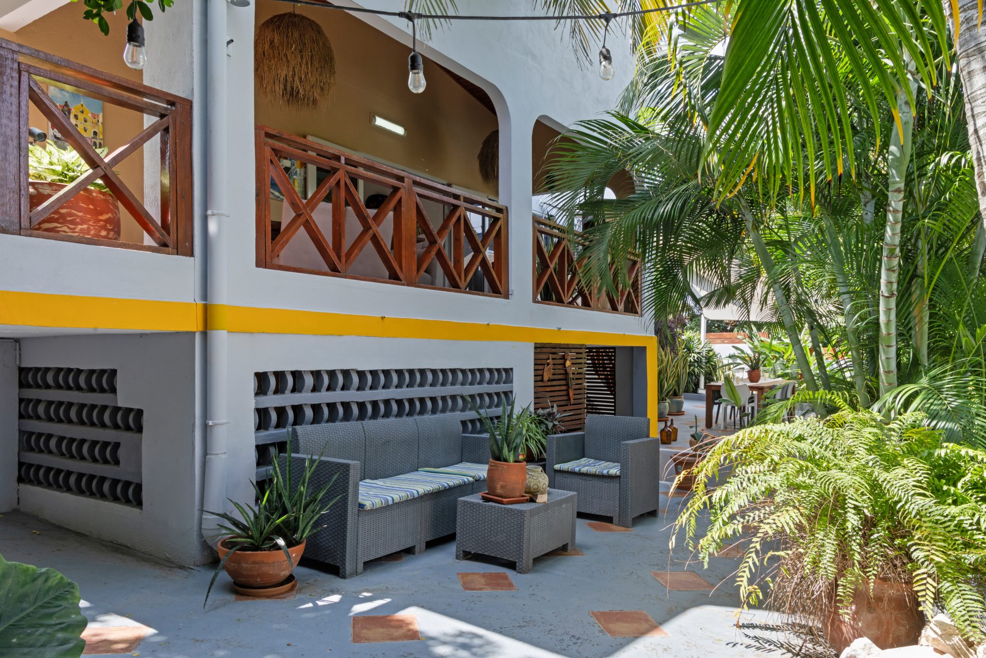 jan thiel villa for sale - outdoor patio with dining table and tile design flooring