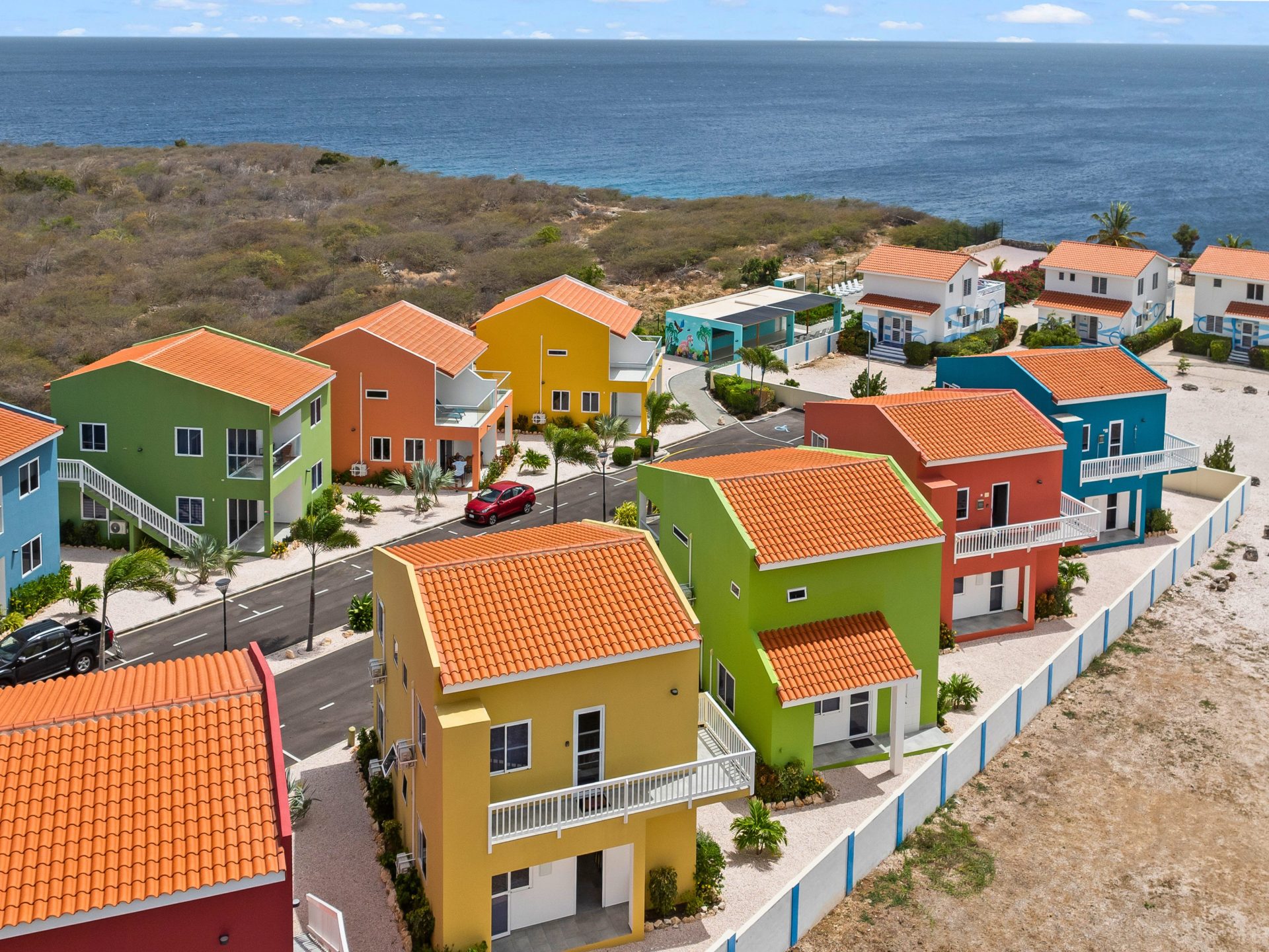 for sale in curaçao real estate colorful ocean view residential community near coastline